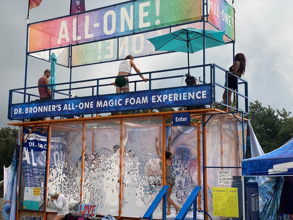 The Magic Foam Experience in a field at a festival.