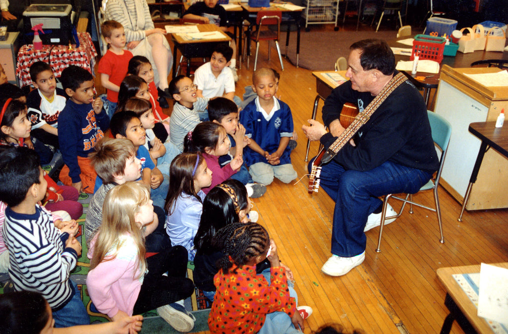 Uncle Ralph talking to a classroom of students.